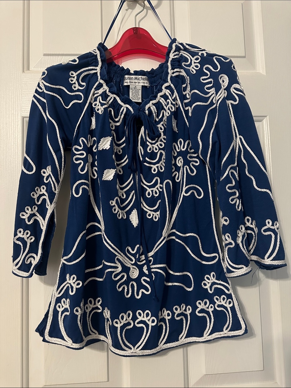Marine blue. Lauren Michelle Top with White and Silver Embroidery.